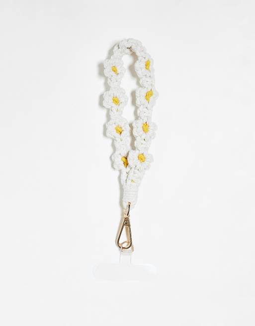 Accessorize – Handy-Handschlaufe in Weiß mit Makramee-Gänseblümchen