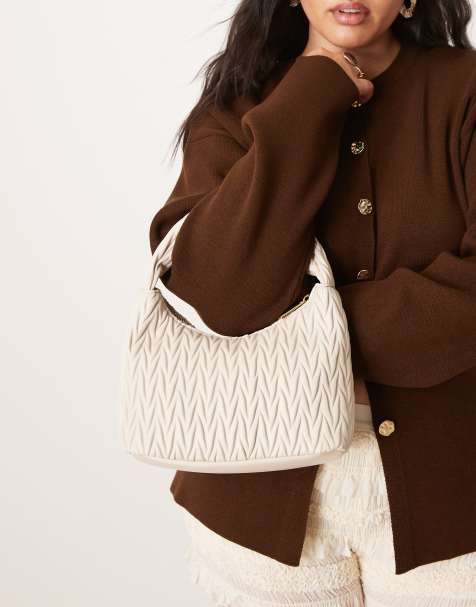 Accessorize – Kremowa pikowana torebka do ręki - view 1