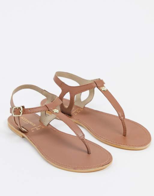 Accessorize leather t bar flat sandals in tan ASOS