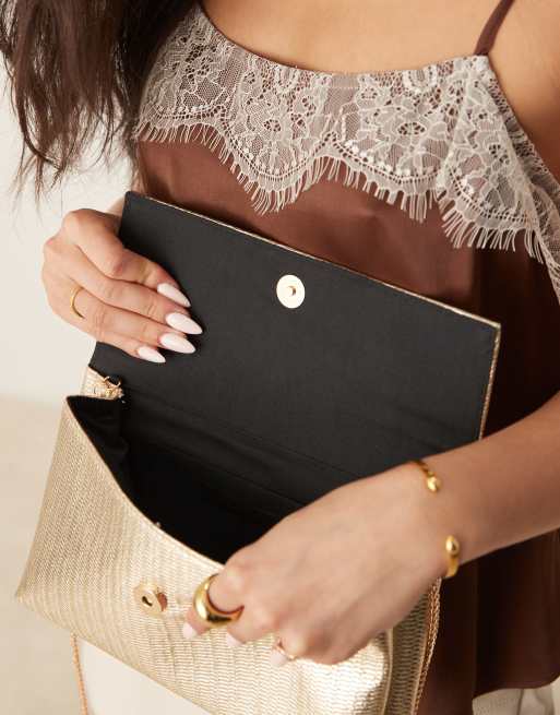 Accessorize metallic foldover clutch in gold ASOS
