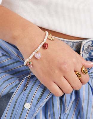 Accessorize - Olivia - Armband aus weißen Kunstperlen mit Frucht-Anhängern