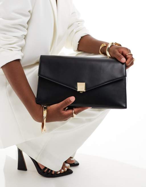 Accessorize oversized clutch in black, 3 of 4