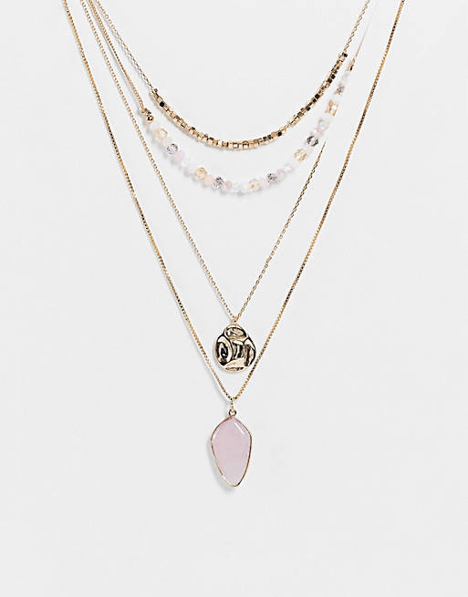 Accessorize pack of 4 layering necklaces with pink stones in gold