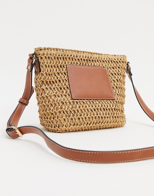 Accessorize panel cross body bag in straw | ASOS