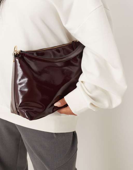 Accessorize patent slouchy handheld bag in burgundy, 4 of 4