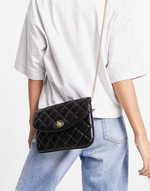 Accessorize quilted clutch bag in black | ASOS