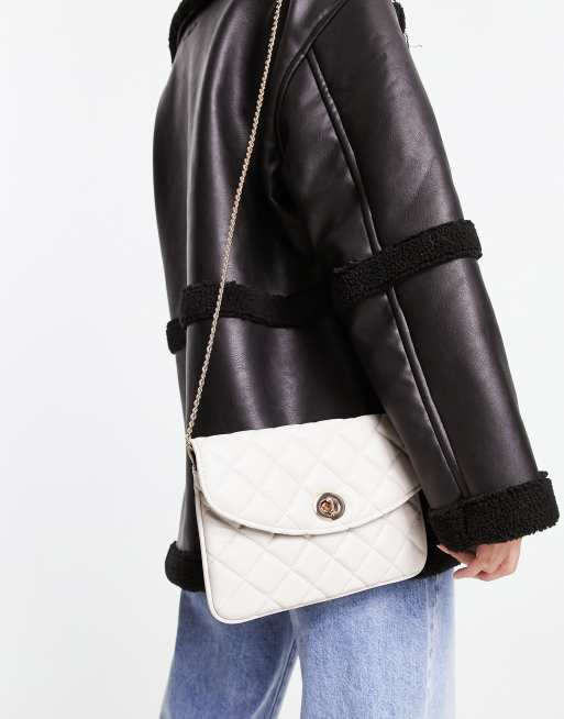 Accessorize quilted clutch bag in white | ASOS