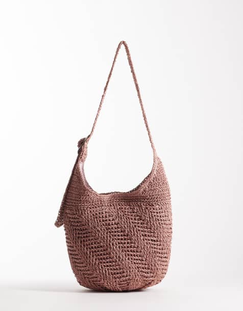 Accessorize - Ruimvallende ronde tas van raffia in roze - view 1