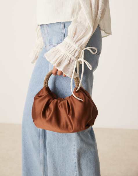Accessorize satin bag with embelished top handle in brown - view 1