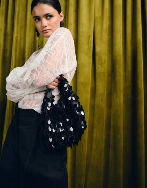 Accessorize sequin fringe handheld bag in black - view 1