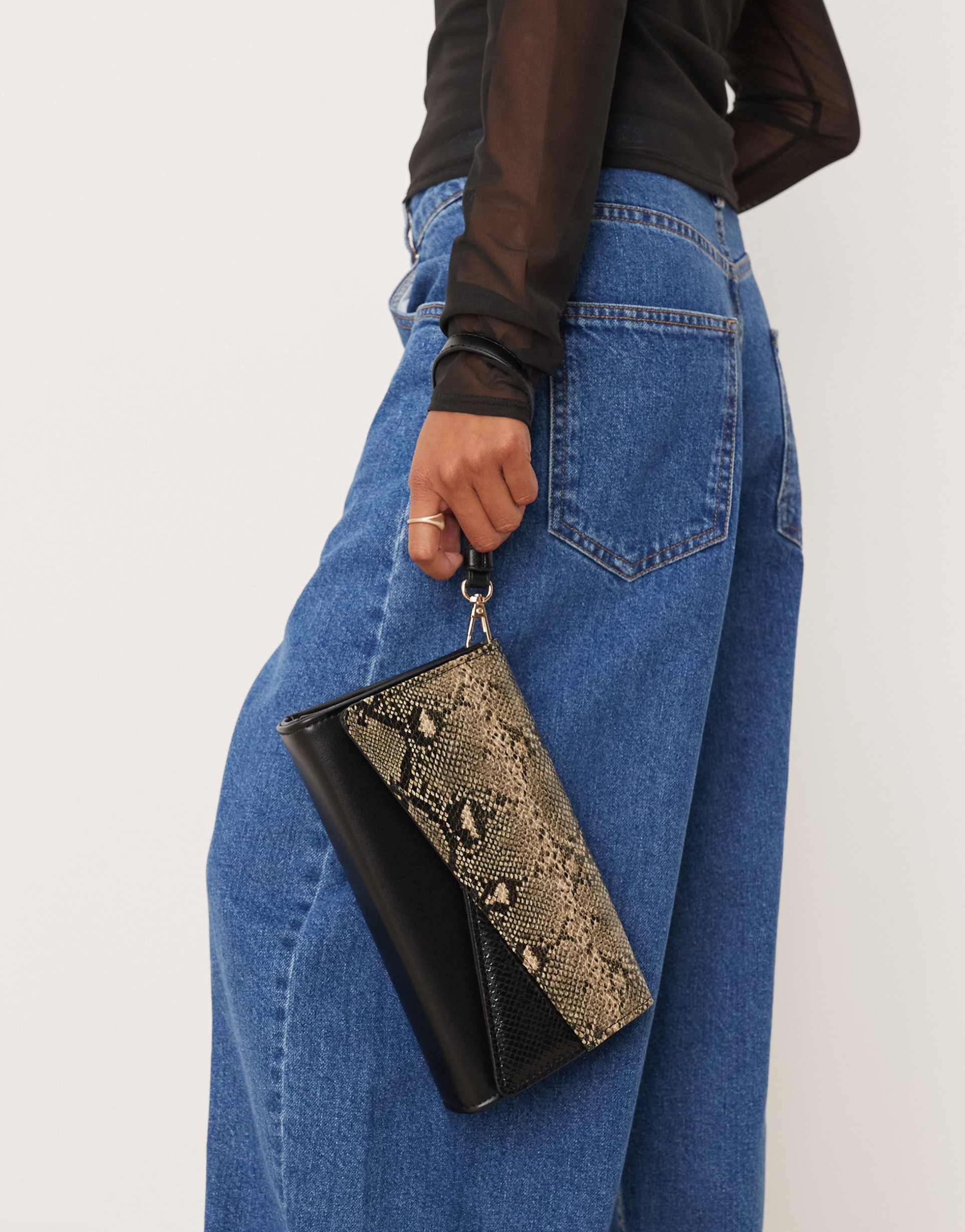 accessorize snake print fold over wristlet bag in multi