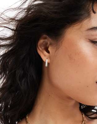 sparkly huggie hoop earrings in silver tone