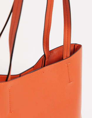 accessorize orange bag