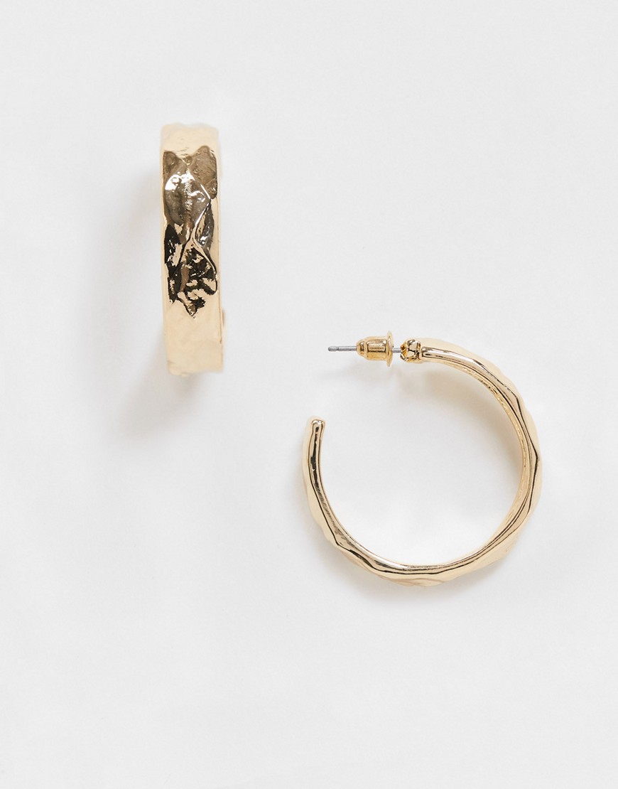 Accessorize textured medium hoops in gold recycled metal