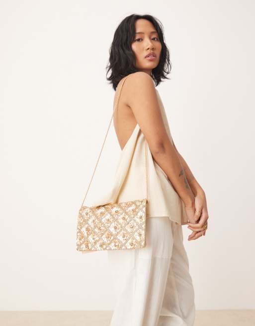 Accessorize - Tianna - Pochette a busta dorata decorata con fiori