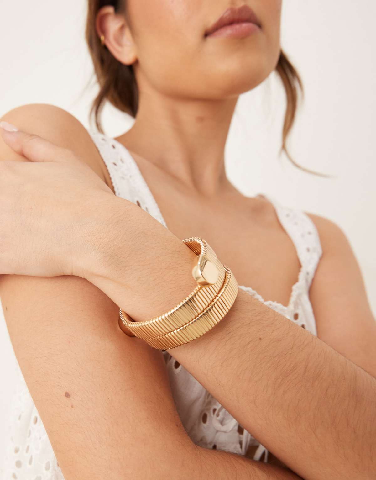 Accessorize wrapped bangle in gold