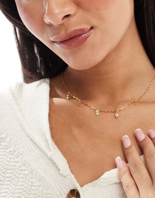 Accessorize - Z Collection - Collier en plaqué or avec breloques célestes et initiale « S » - Doré