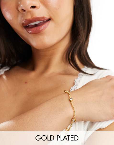 Accessorize - Z Collection - Vergulde schakelarmband met harthangertjes met siertsteentjes - view 1