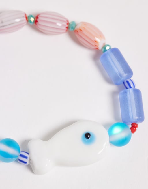 Accessorize – Zestaw 3 elastycznych bransoletek w różnych kolorach z motywem ryb, 3 z 3
