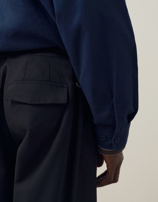A.Collective box pleat chinos in black, 5 of 9