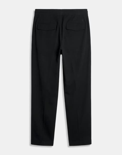 A.Collective chinos med motveck i svart, 7 av 9