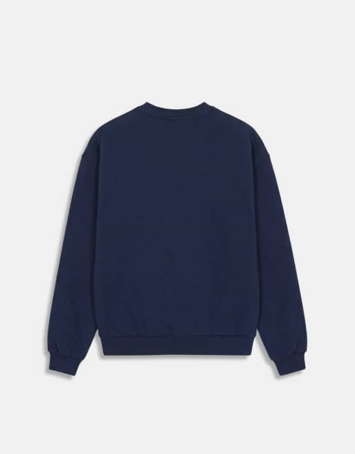 A.Collective heavyweight crew neck sweater with chest print in navy, 7 of 9