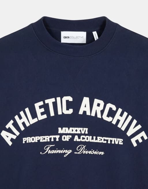 A.Collective heavyweight crew neck sweater with chest print in navy, 9 of 9
