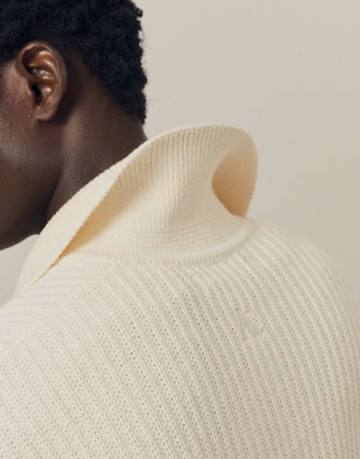 A.Collective knitted polo in beige, 2 of 9