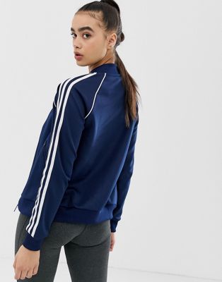 adidas originals three stripe track jacket in blue