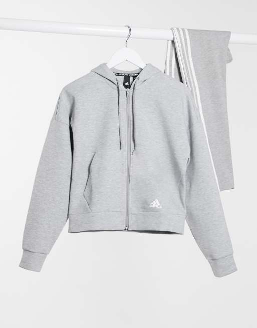 grey adidas hoodie with white stripes