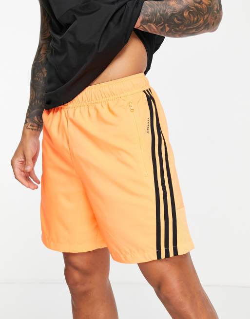 adidas 3 stripe shorts in orange | ASOS