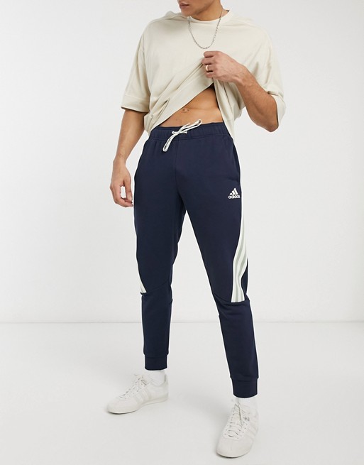 adidas 3 stripe taped joggers in navy