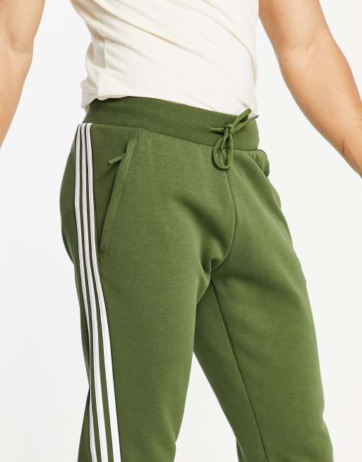 adidas stripe trackies in khaki ASOS