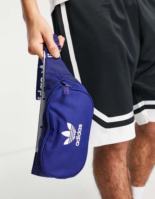 adidas Adicolor branded webbing waist bag in blue | ASOS
