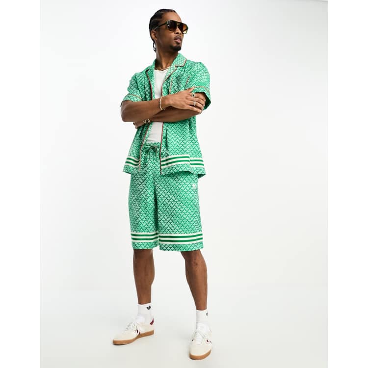 adidas Adicolor Modern 70s Monogram shorts in green | ASOS