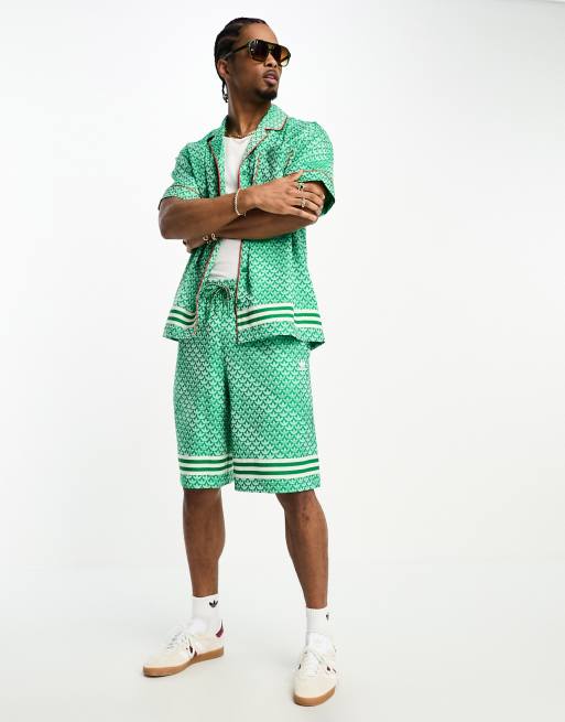 adidas Adicolor Modern 70s Monogram shorts in green ASOS
