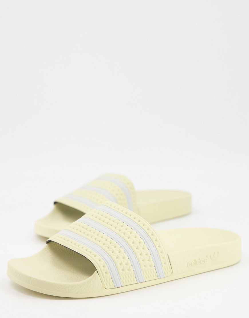 Adidas Adilette slides in sand yellow