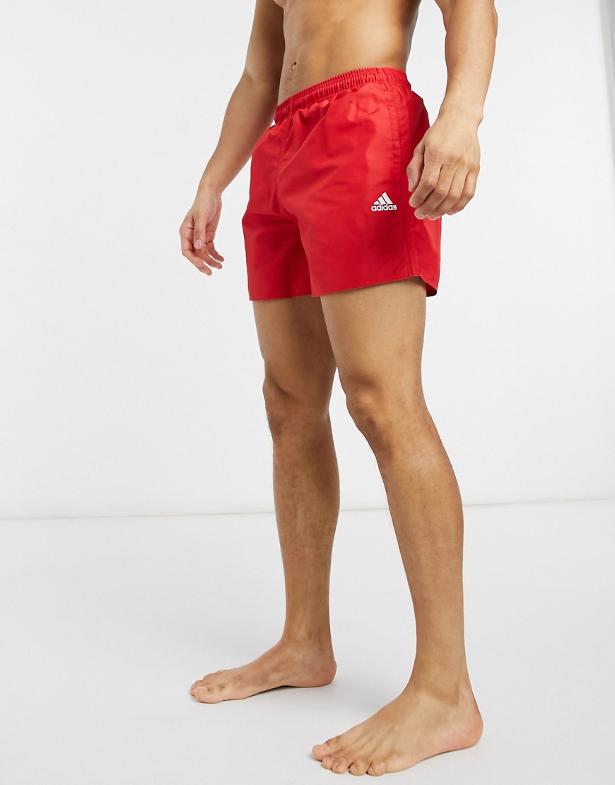 Adidas badge of sport logo swim shorts in red