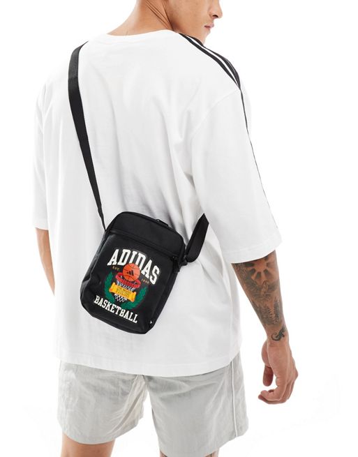 adidas Basketball Hoops cross body back in black with graphic 