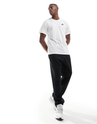 adidas Basketball joggers in black