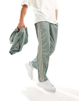adidas Basketball joggers in silver green - ASOS Price Checker