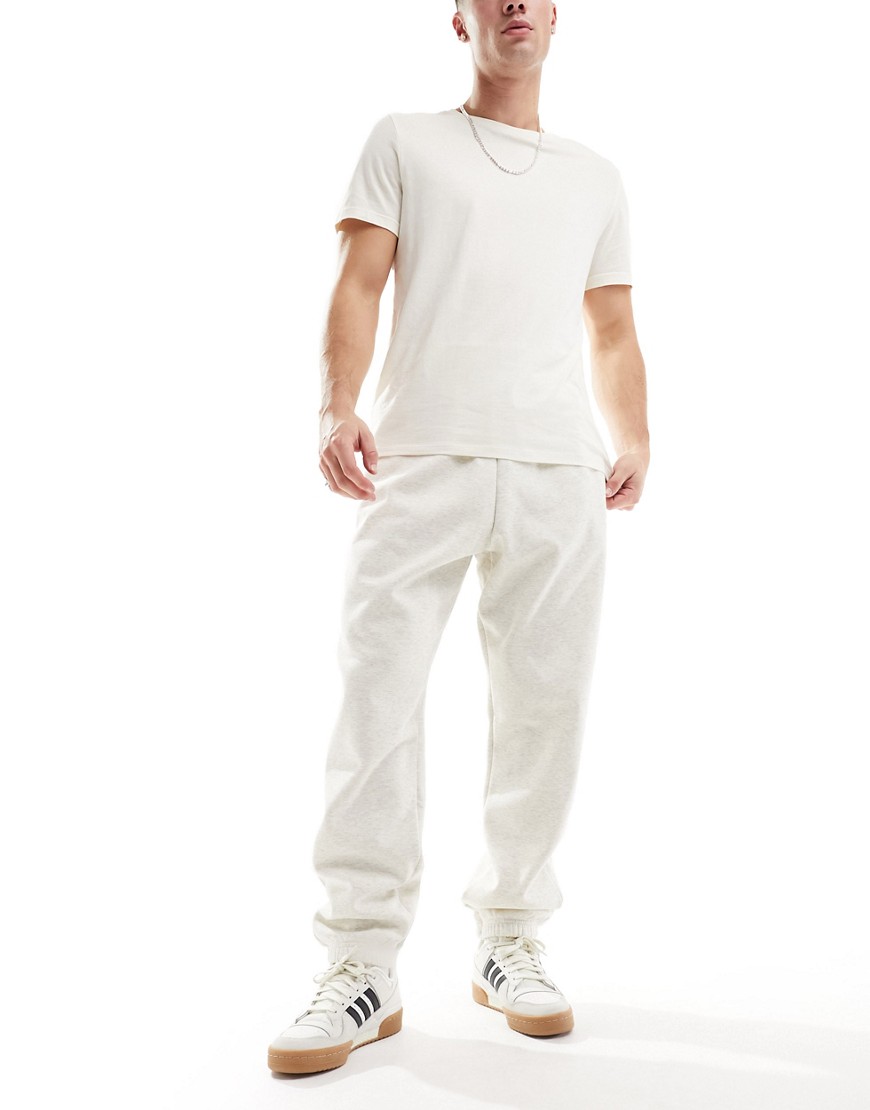 adidas Basketball One joggers in off white
