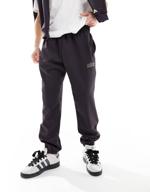 adidas – Basketball Select – Lila träningsoverallsbyxor