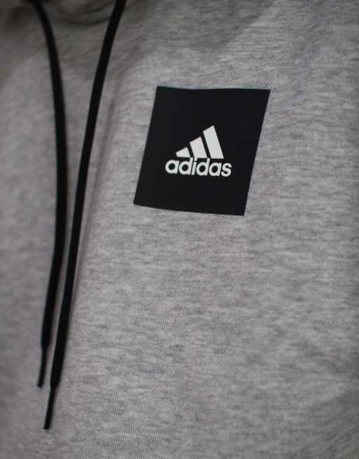 Grey adidas hoodie shop with black logo