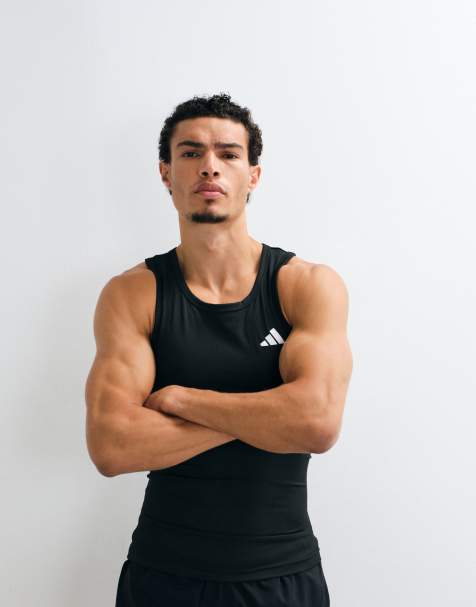 adidas - camiseta sin mangas acanalada Training Essentials en negro - view 1