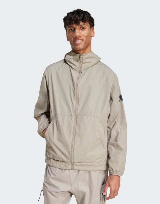 adidas – City Escape – Gråbeige vindjacka