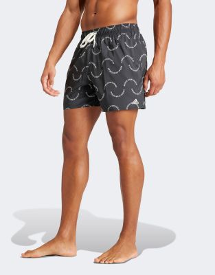 adidas – CLX – Badeshorts in Schwarz mit welligem Logomuster