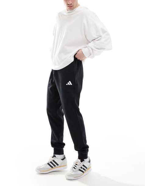 adidas Essentials feel cozy french terry pants in black / white - BLACK