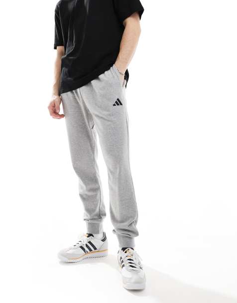 adidas - Essentials Feel Cozy - Pantaloni grigio medio mélange e neri in spugna - view 1