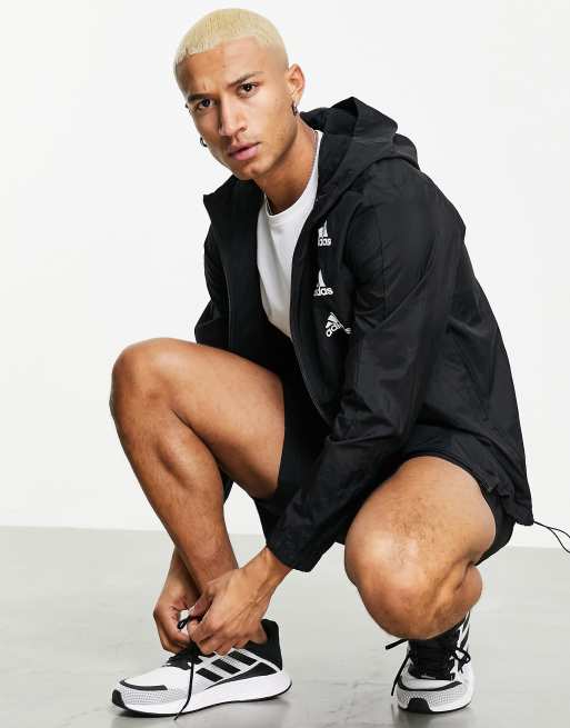 adidas Essentials Gradient logo windbreaker in black | ASOS